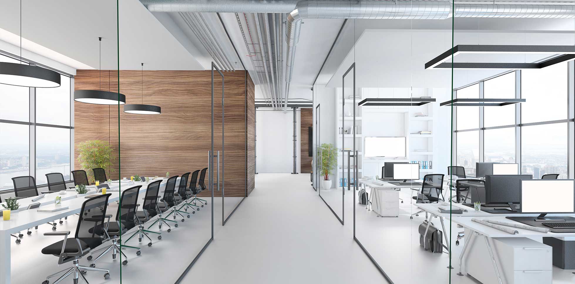 Glass partitions separating office meeting rooms