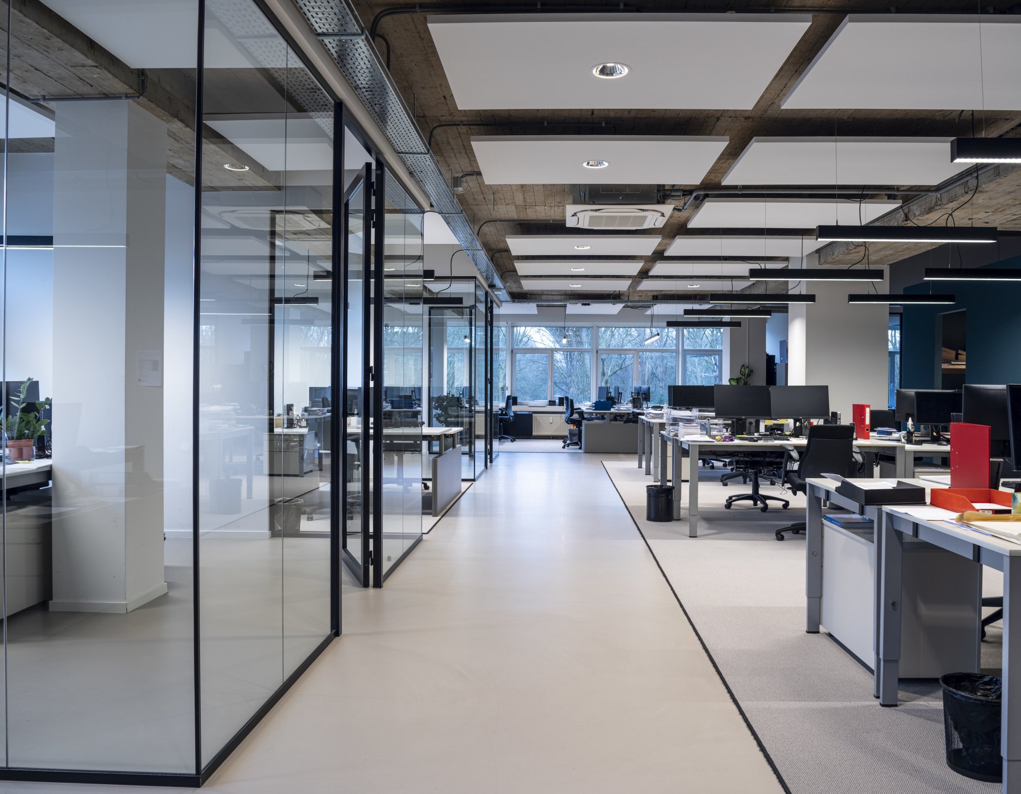 Open plan glass partitioned office